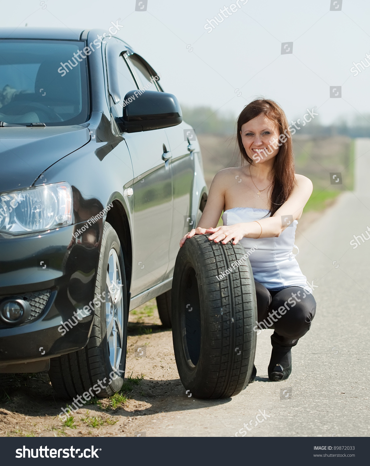 Woman Changing Car Wheel At Road Stock Photo 89872033 : Shutterstock