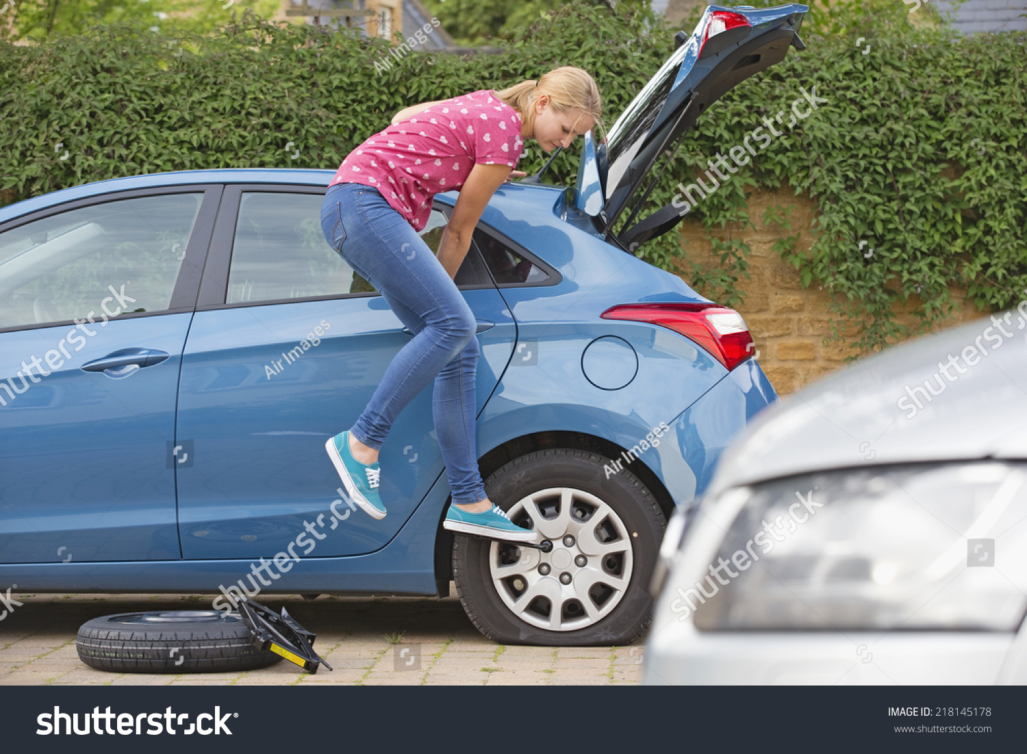 Changing a flat tire Changing a flat tire