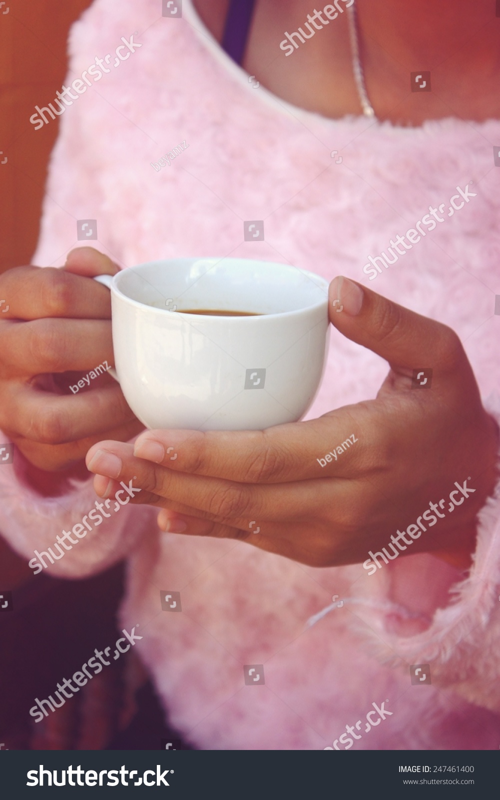 woman-drinking-hot-coffee-stock-photo-edit-now-247461400