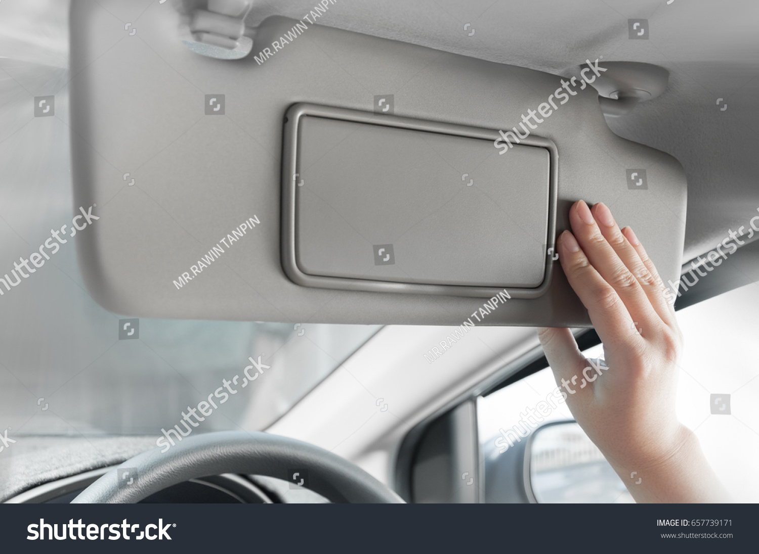 how to open sun visor in car