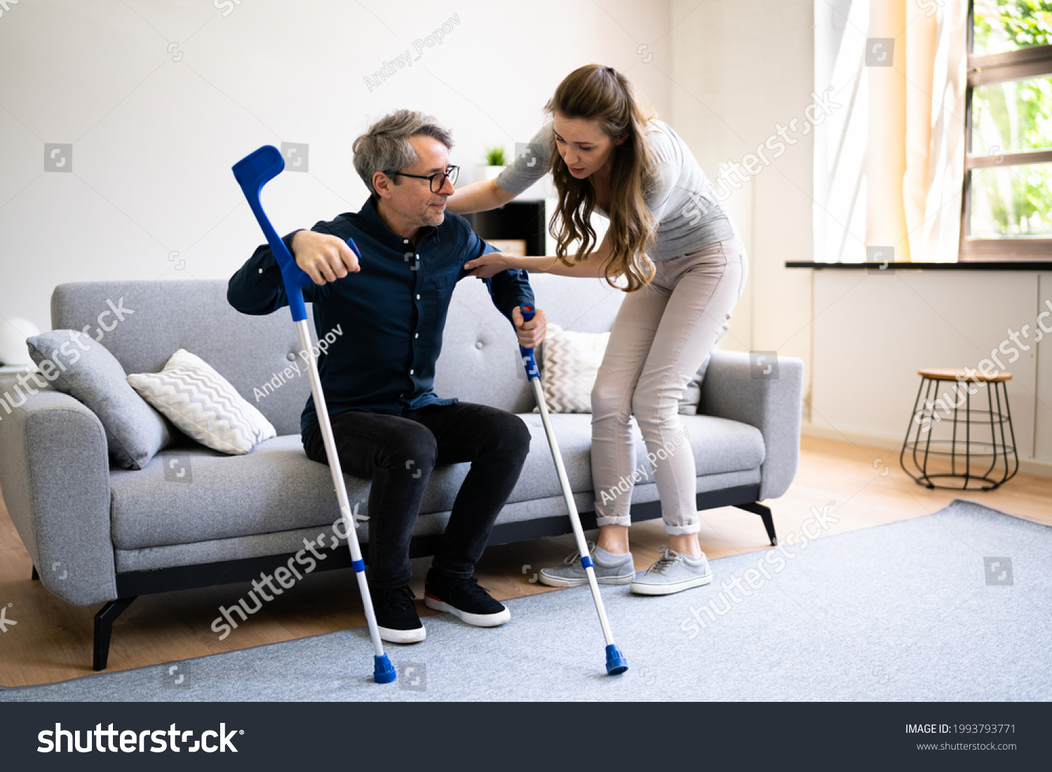 Woman Helping Injured Handicapped Man Crutches Stock Photo 1993793771 ...