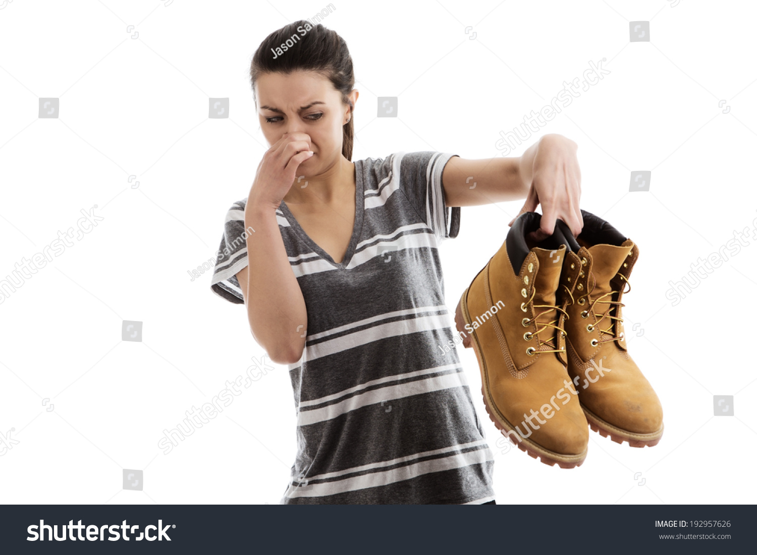 Woman Holding Pair Men Smelly Work Stock Photo 192957626 ...