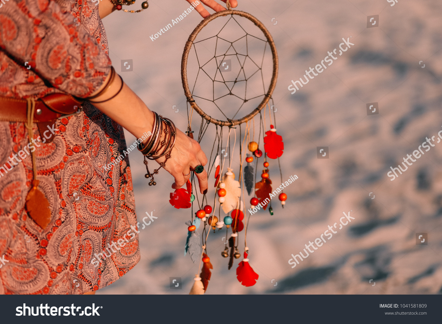 Woman Holding Indian Decoration Against Backdrop Beauty Fashion