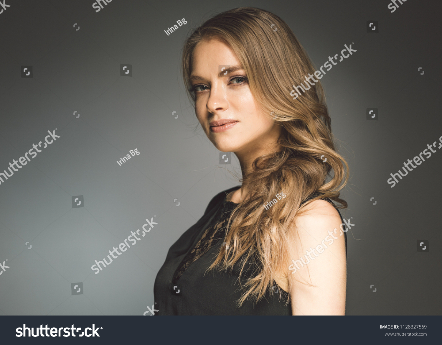 Woman Black Dress Long Blonde Hair Stock Photo Edit Now 1128327569