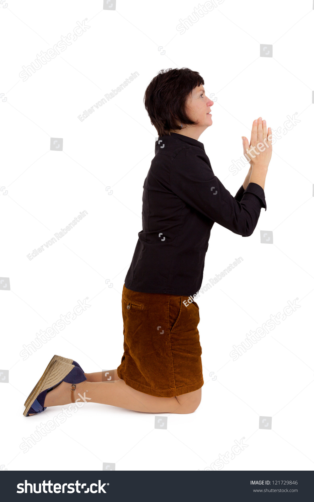 Woman Kneeling Praying Stock Photo 121729846 - Shutterstock