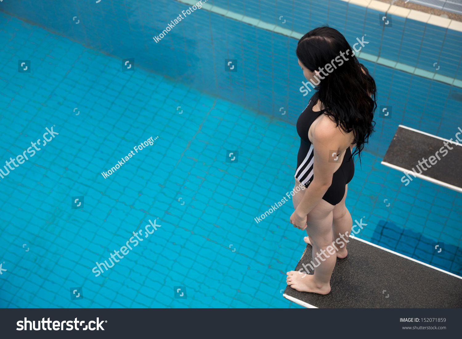 Public Swimming Pools With Diving Boards woman on diving board public swimming stock photo 152071859 Public Swimming Pools With Diving Boards woman on diving board public swimming stock photo 152071859