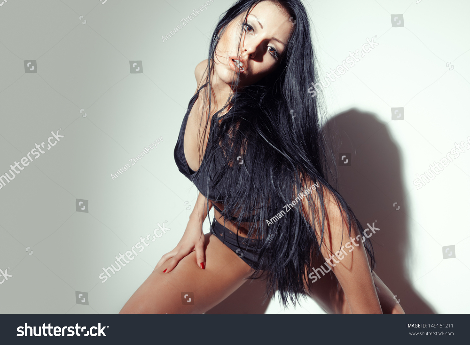 Woman Performing Seductive Dance Against Wall Stock Photo Shutterstock