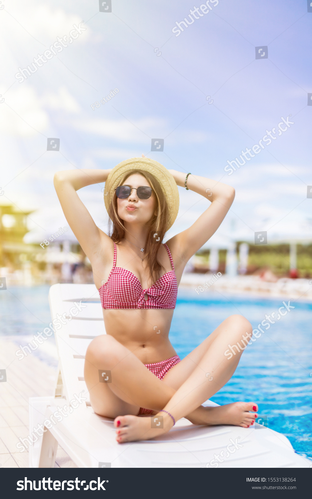 Woman Relaxing Chaise Lounge Poolside Stock Photo 1553138264 Shutterstock