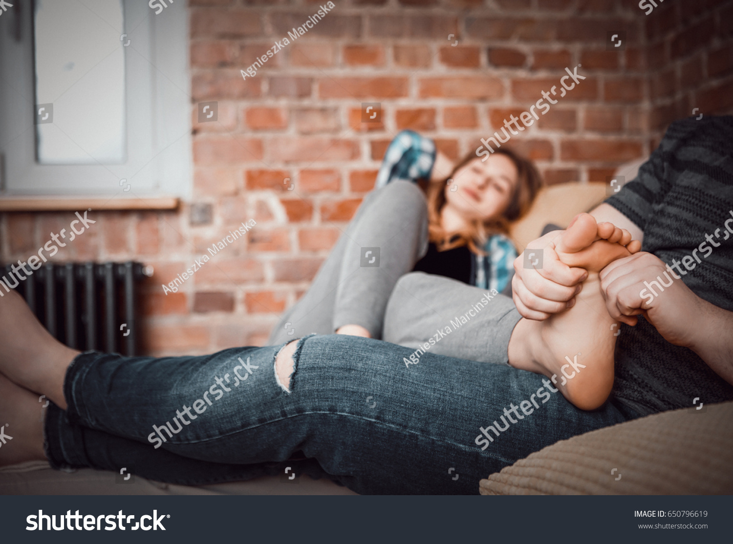 Women feet massaging