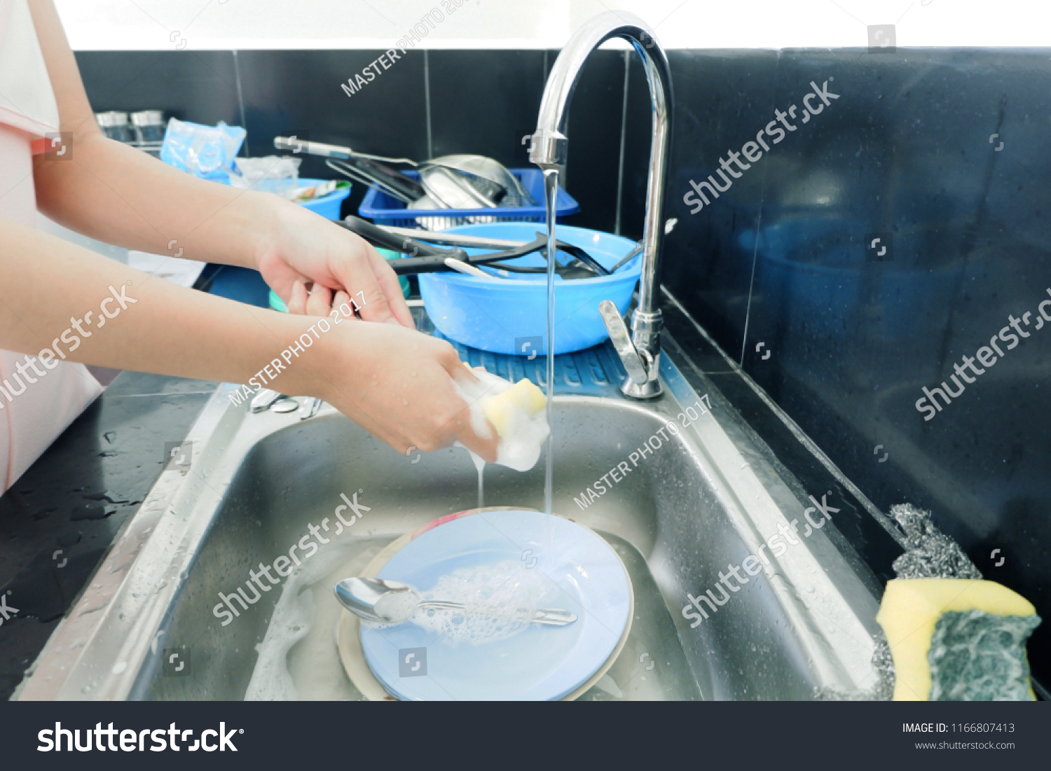 Womans Hand Washing Dishes Fork Spoon Stock Photo 1166807413 | Shutterstock