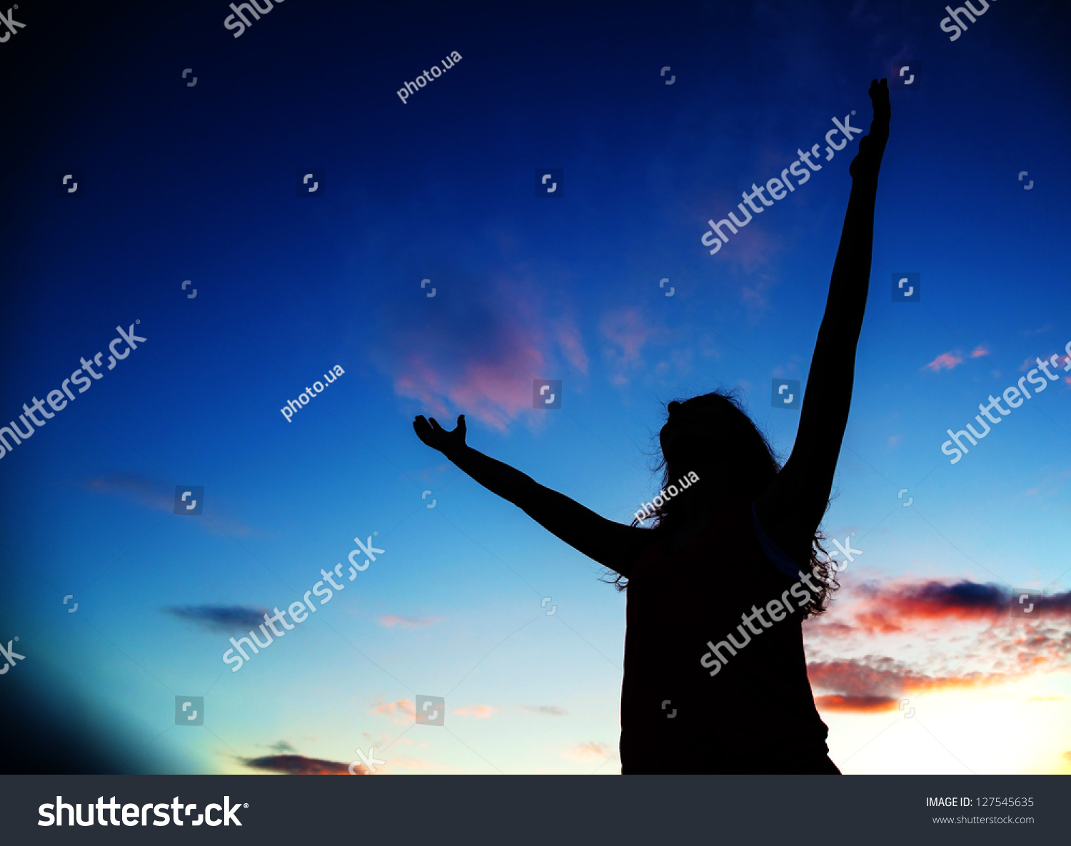 Woman Staying With Raised Hands At The Sunset Time Stock Photo ...