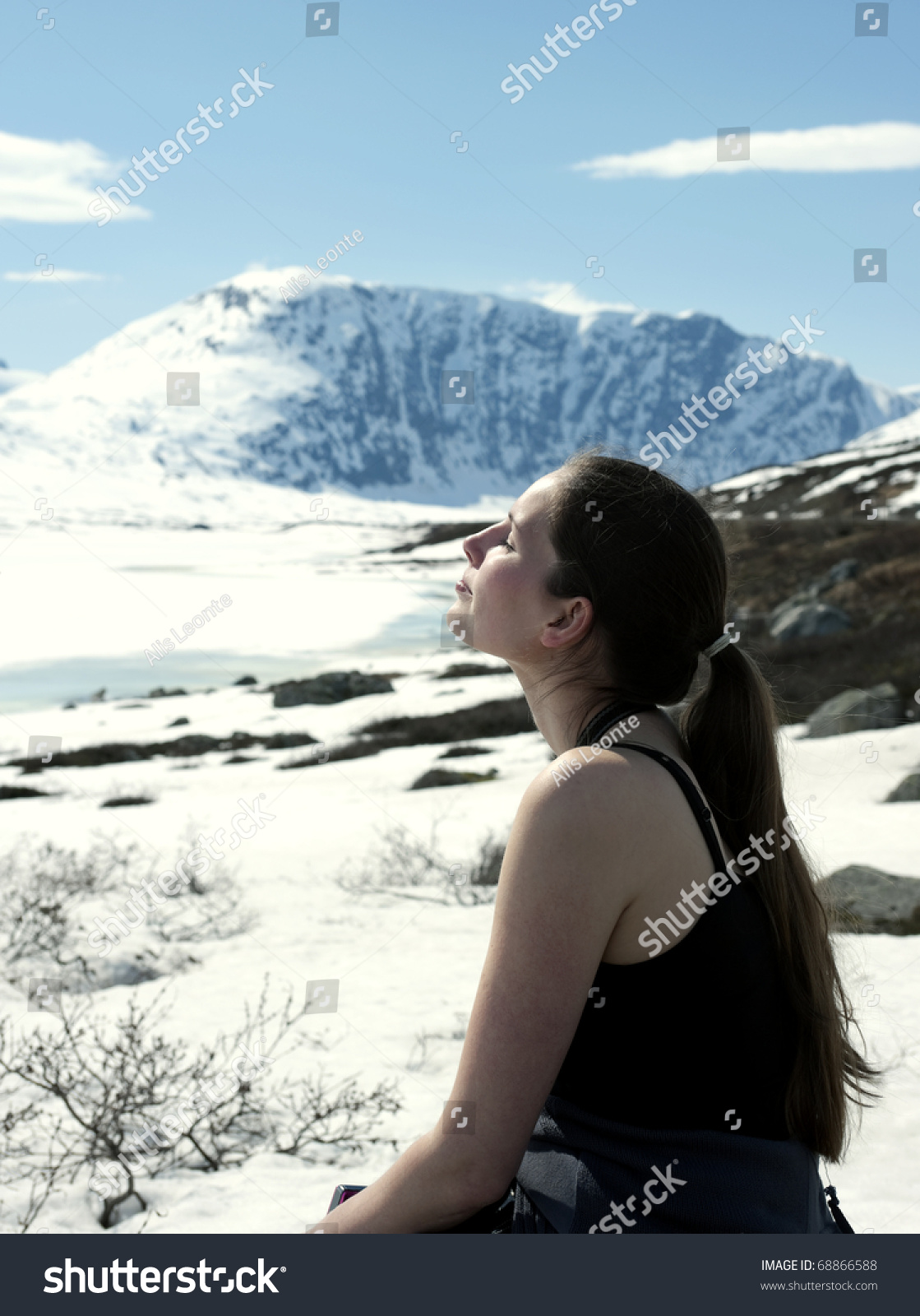 Woman Take A Sunbath In Winter Landscape Stock Photo 68866588 ...