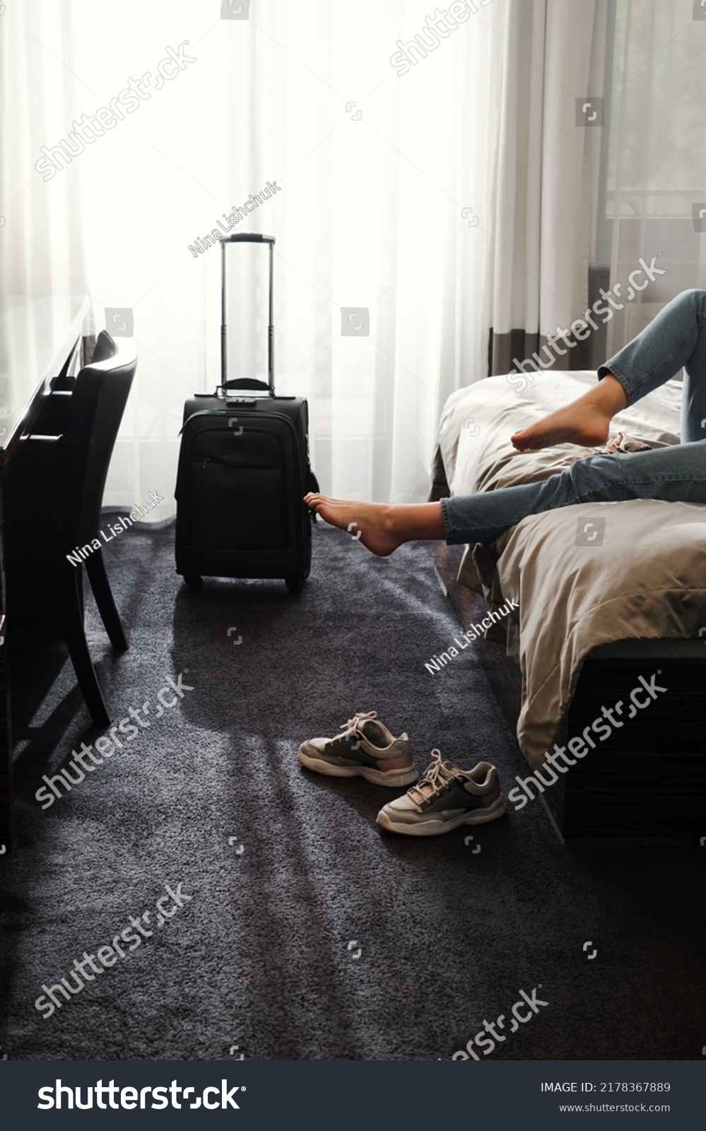 Woman Taking Off Footwear Hotel Room Stock Photo 2178367889 | Shutterstock