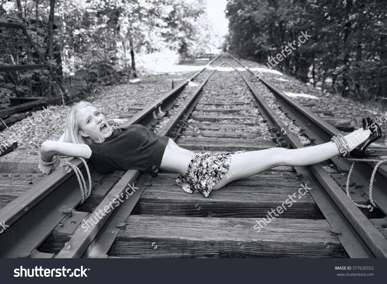 Girl Tied To Tracks