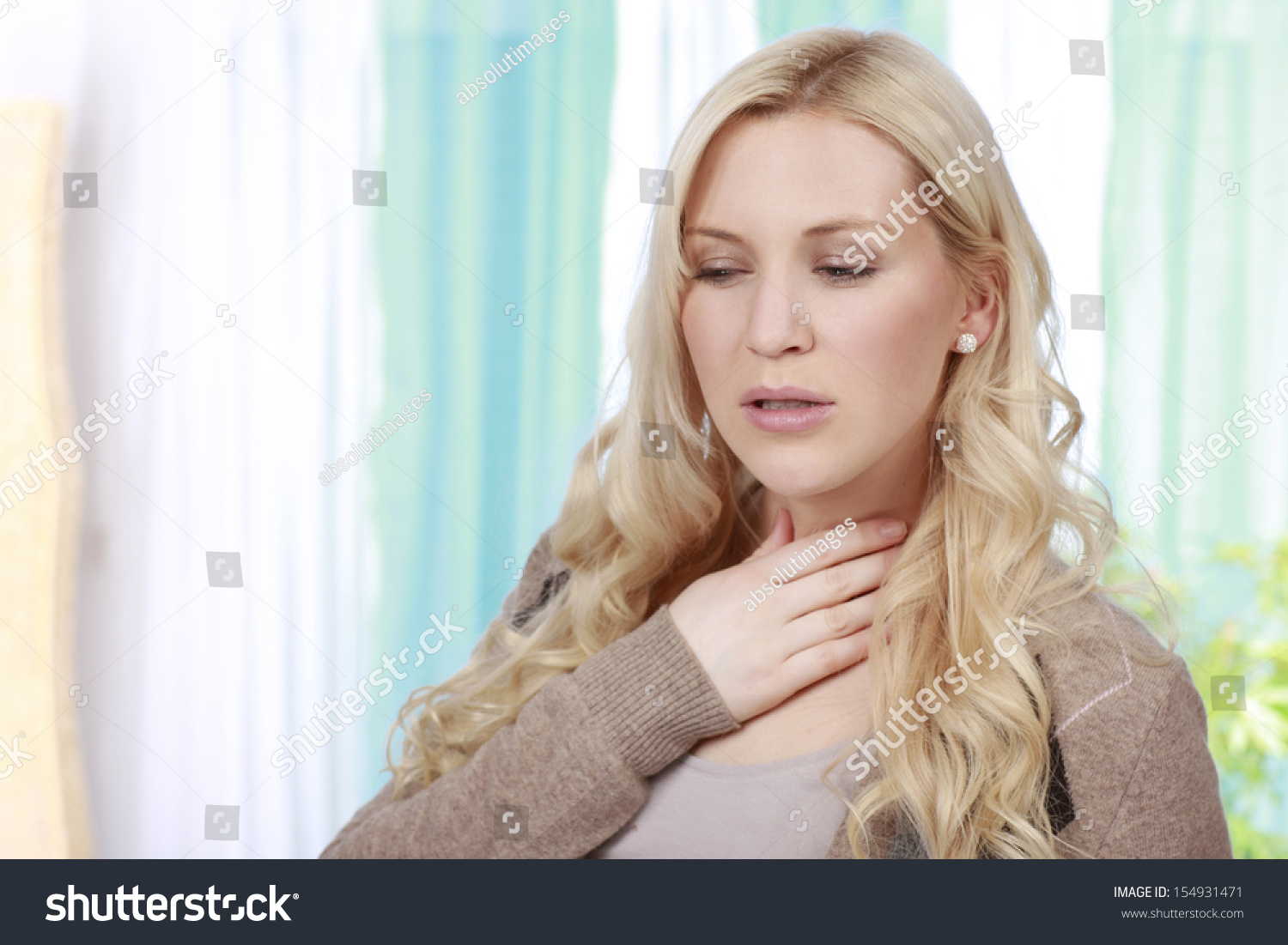 Woman Touches Her Throat Stock Photo 154931471 : Shutterstock