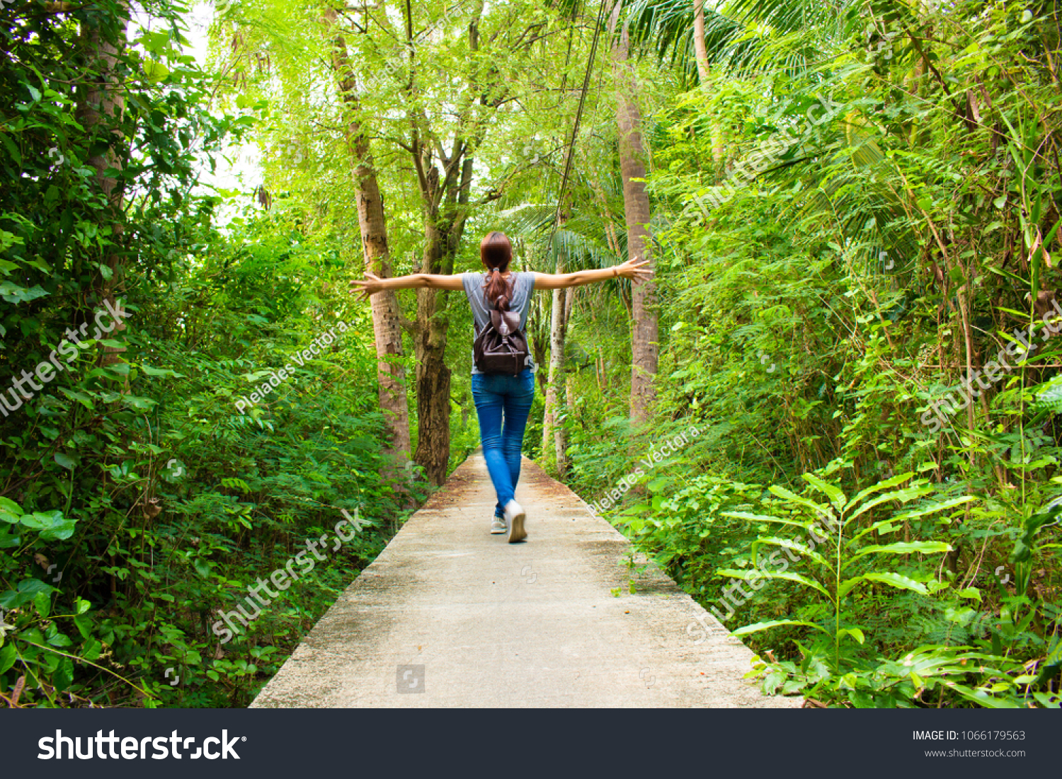 Woman Walking On Cement Bridge Forest Stock Photo Edit Now