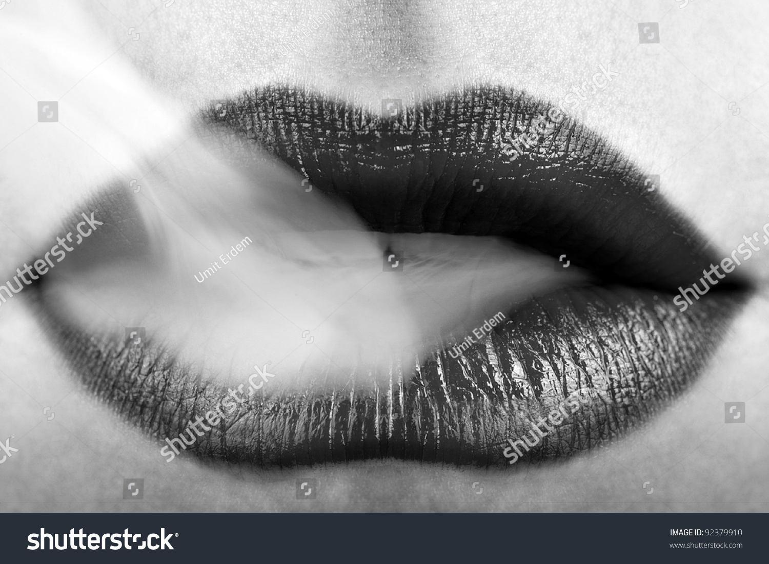 Woman Wearing Black Lipstick And Blowing Smoke Stock Photo 92379910 ...