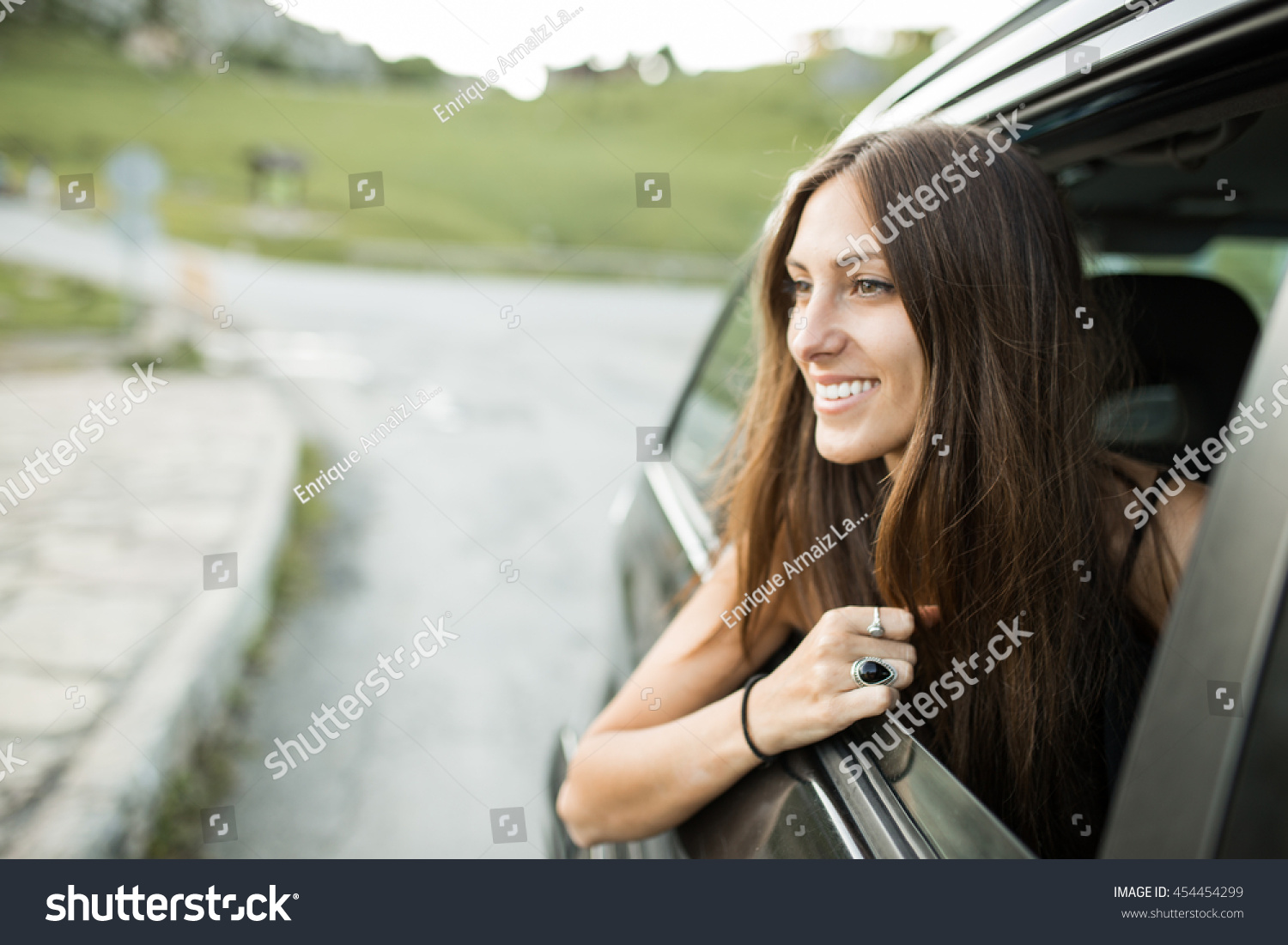 Woman With Head Out Of The Window Of A Car Stock Photo 454454299 ...