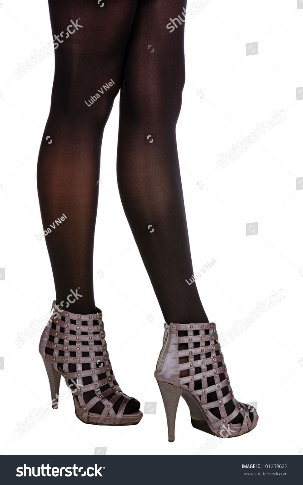 Woman With Long Legs In Black Stockings Wearing Satin Gladiator Sandals ...