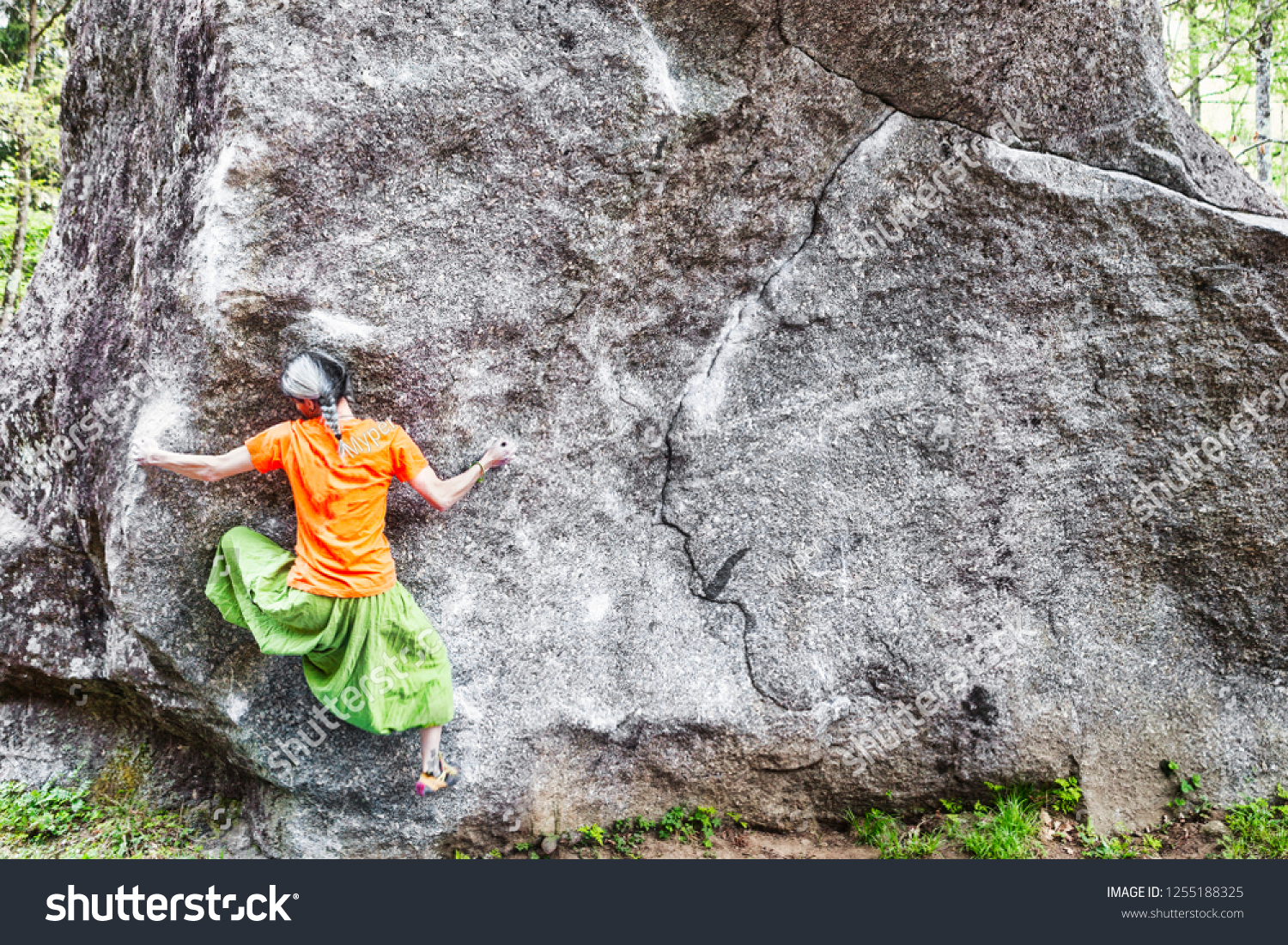 orange shirt green pants