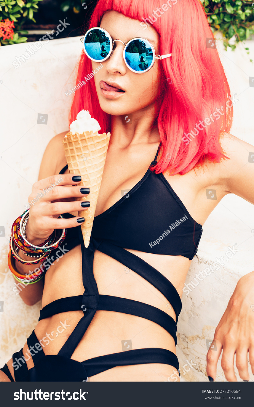 Ebony sexy lady eating ice cream