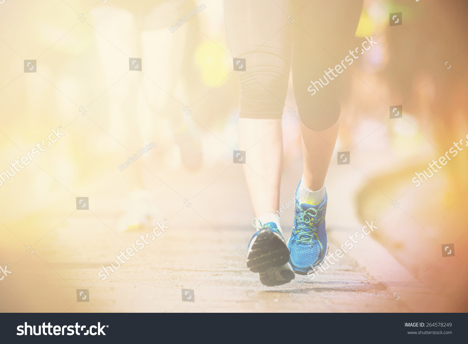 running barefoot on asphalt