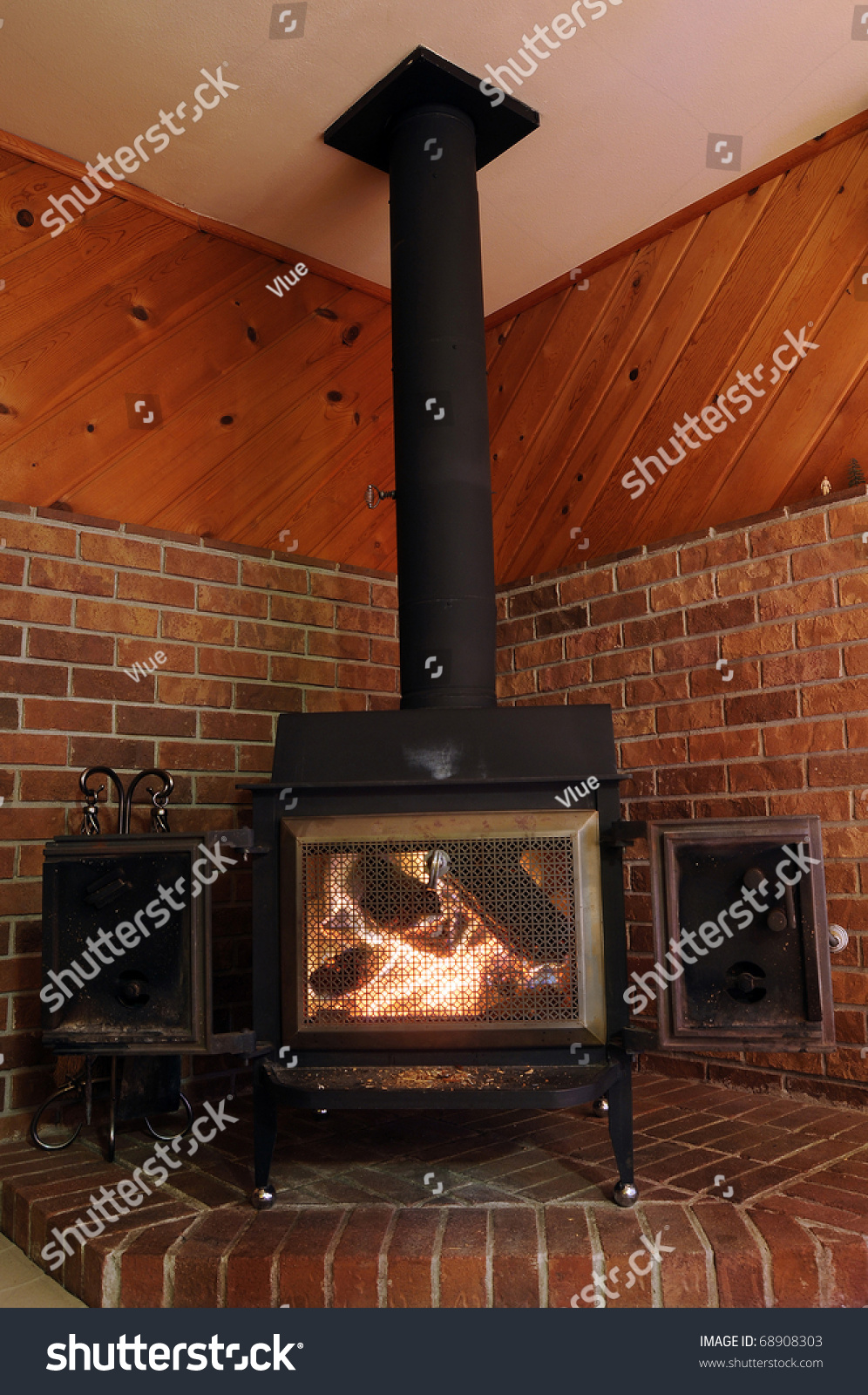 Wood Stove On Red Brick Metal Stock Photo Edit Now 68908303