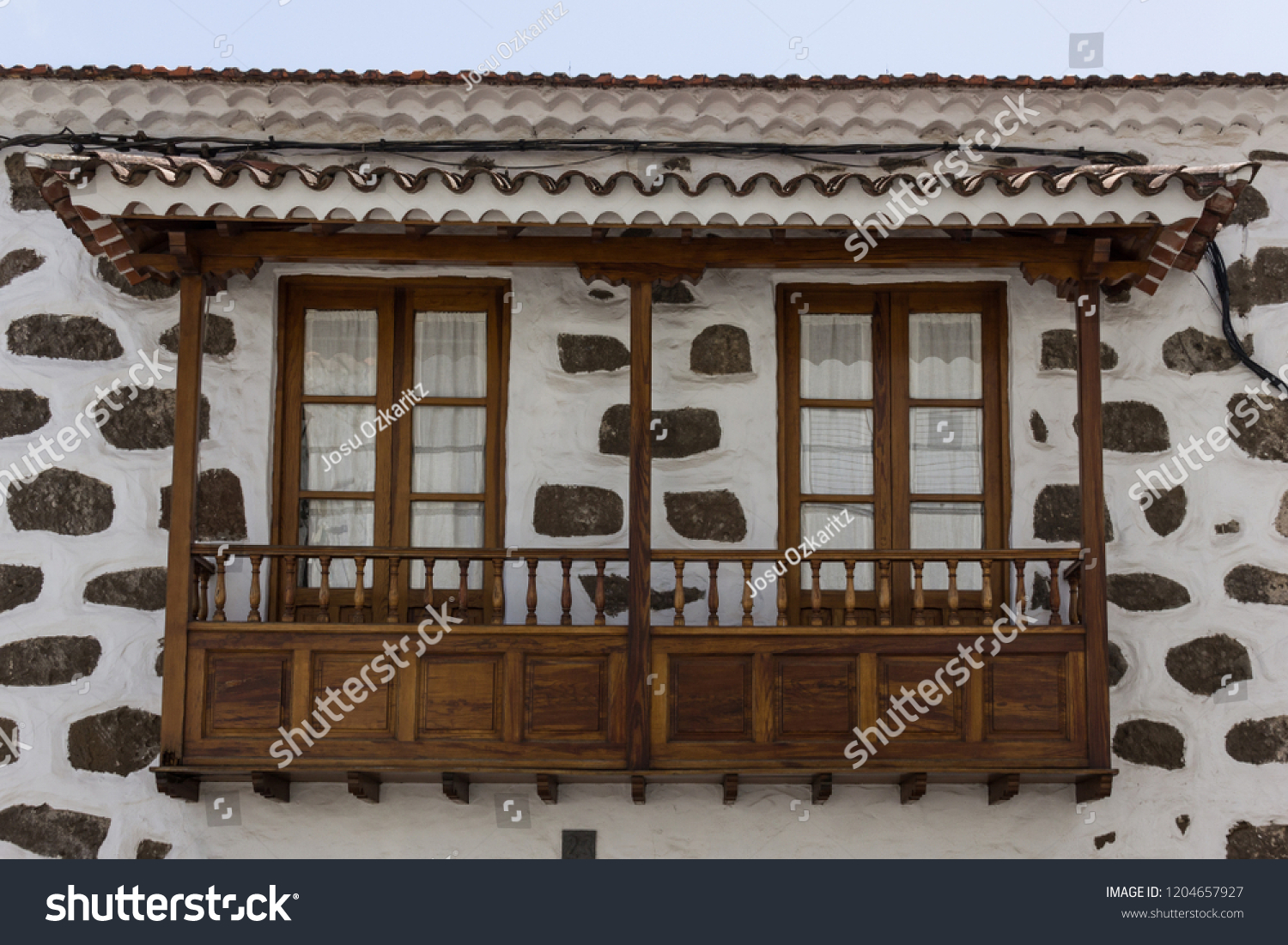 Wooden Balcony Stone White House San Stock Photo Edit Now 1204657927