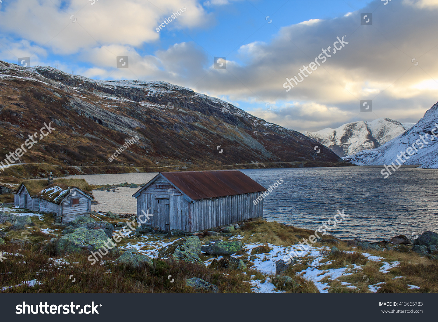 Wooden Cabins Lake Shore During Blue Stock Photo Edit Now 413665783