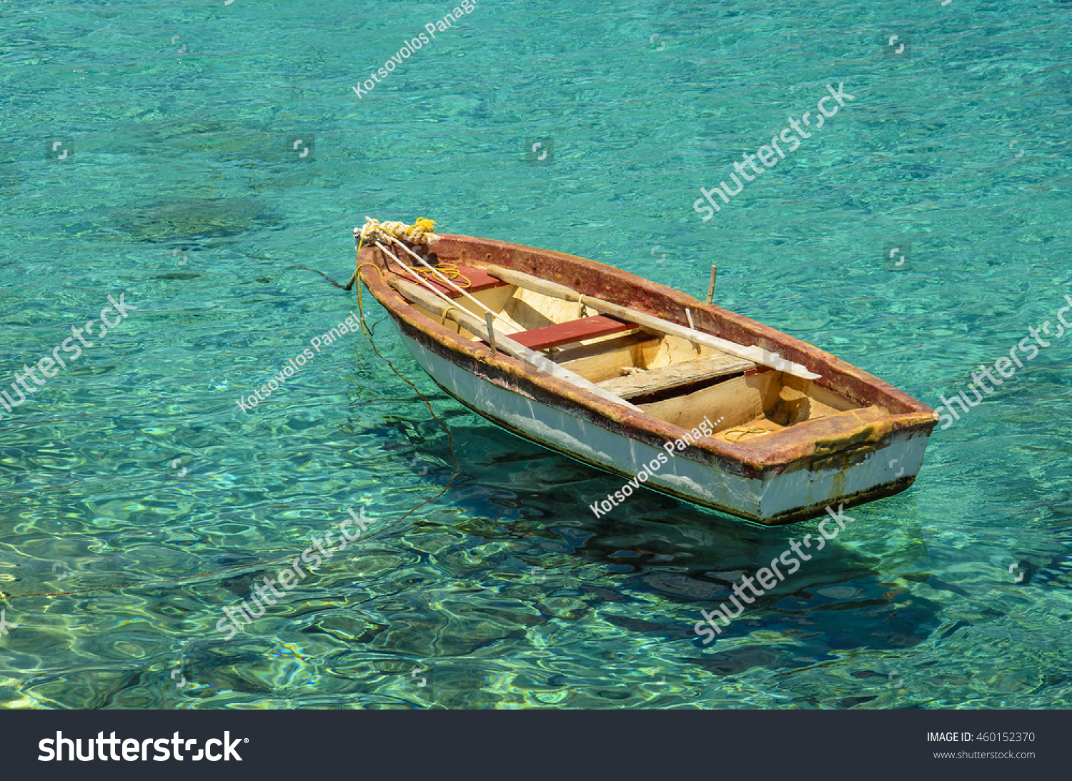 floating boat images wooden fishing boat floating on colourful stock photo floating boat images wooden fishing boat floating on colourful stock photo