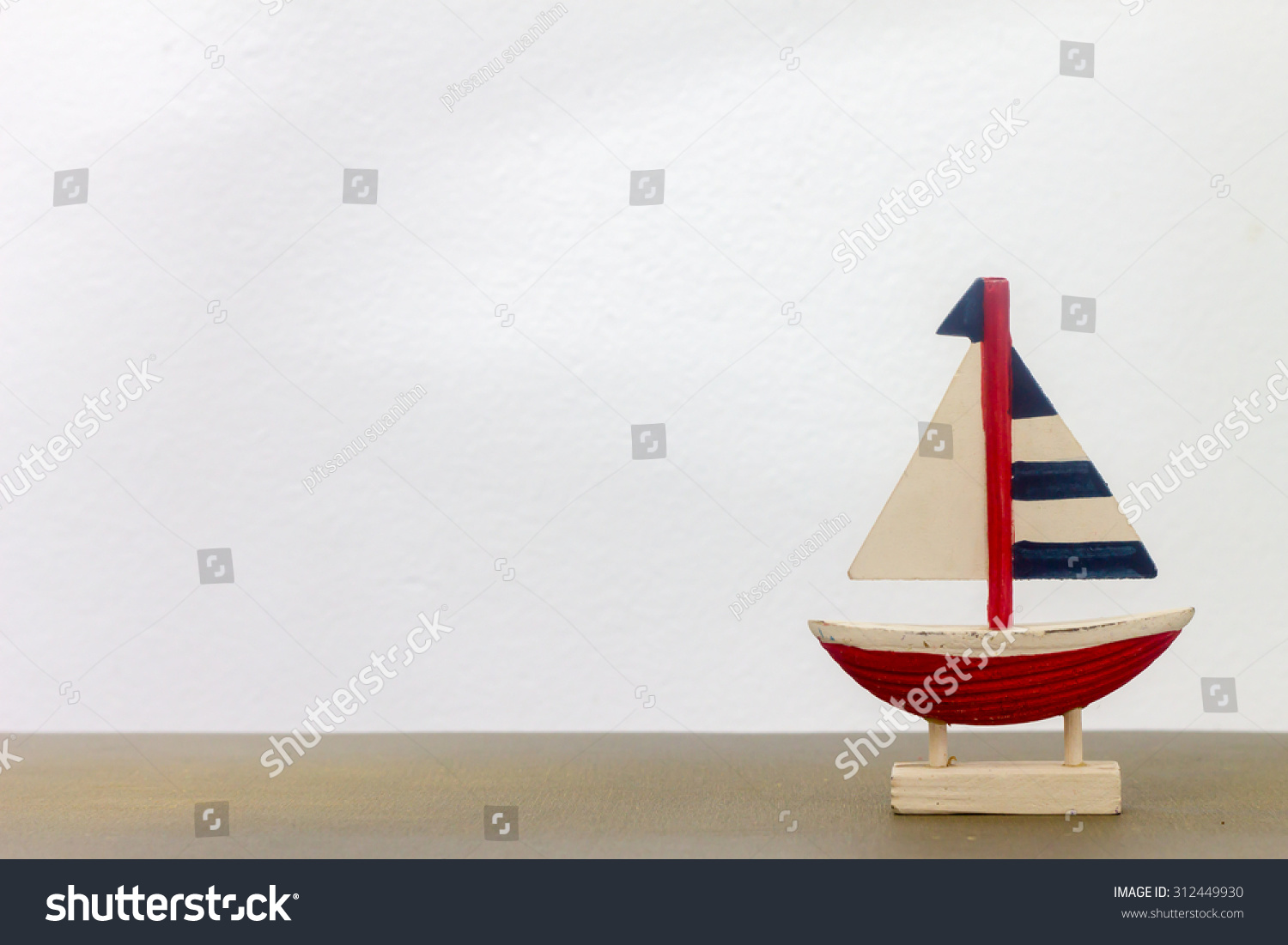 wooden toy sailboat