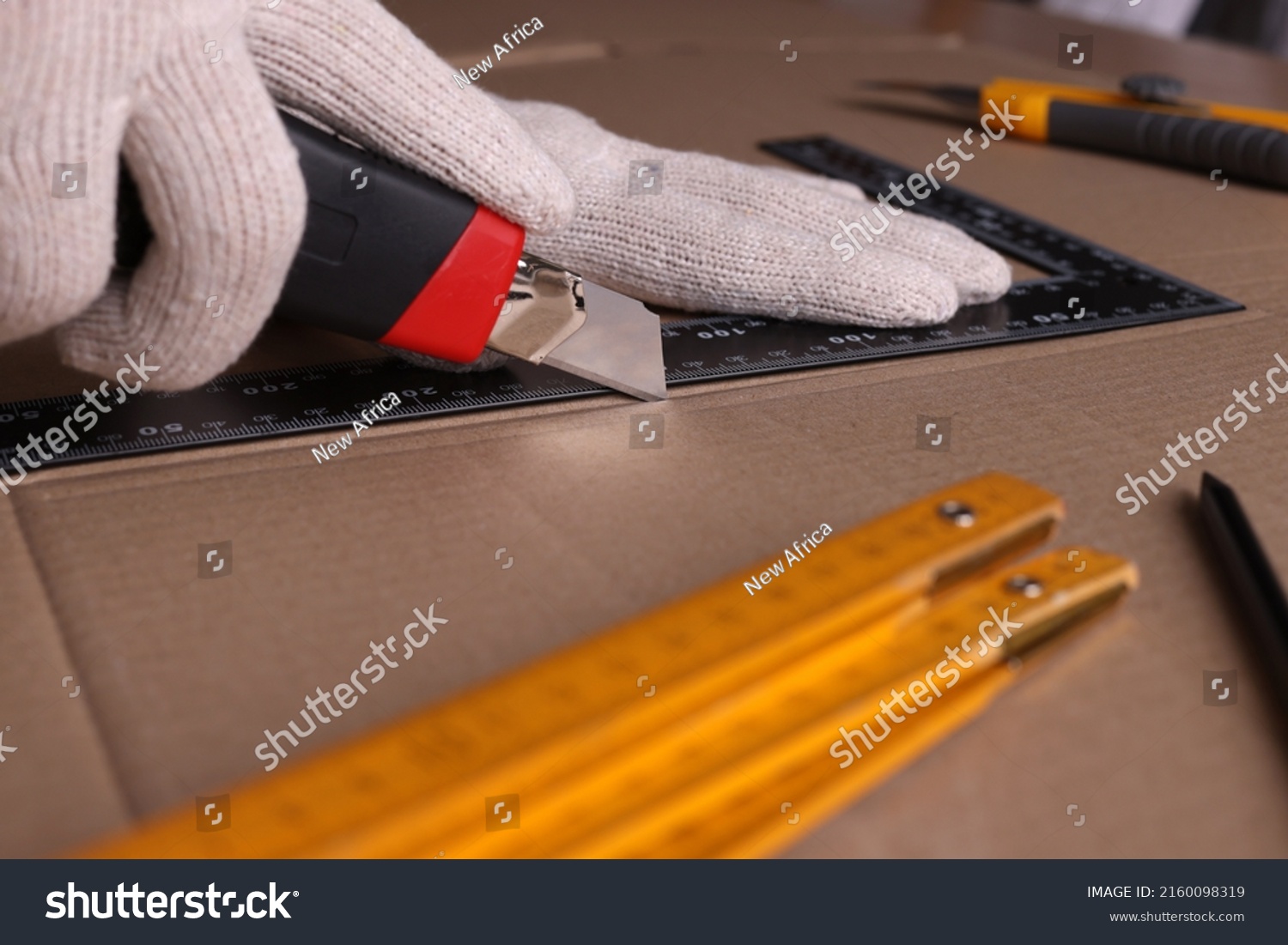 Worker Cutting Cardboard Utility Knife Ruler Stock Photo 2160098319 ...