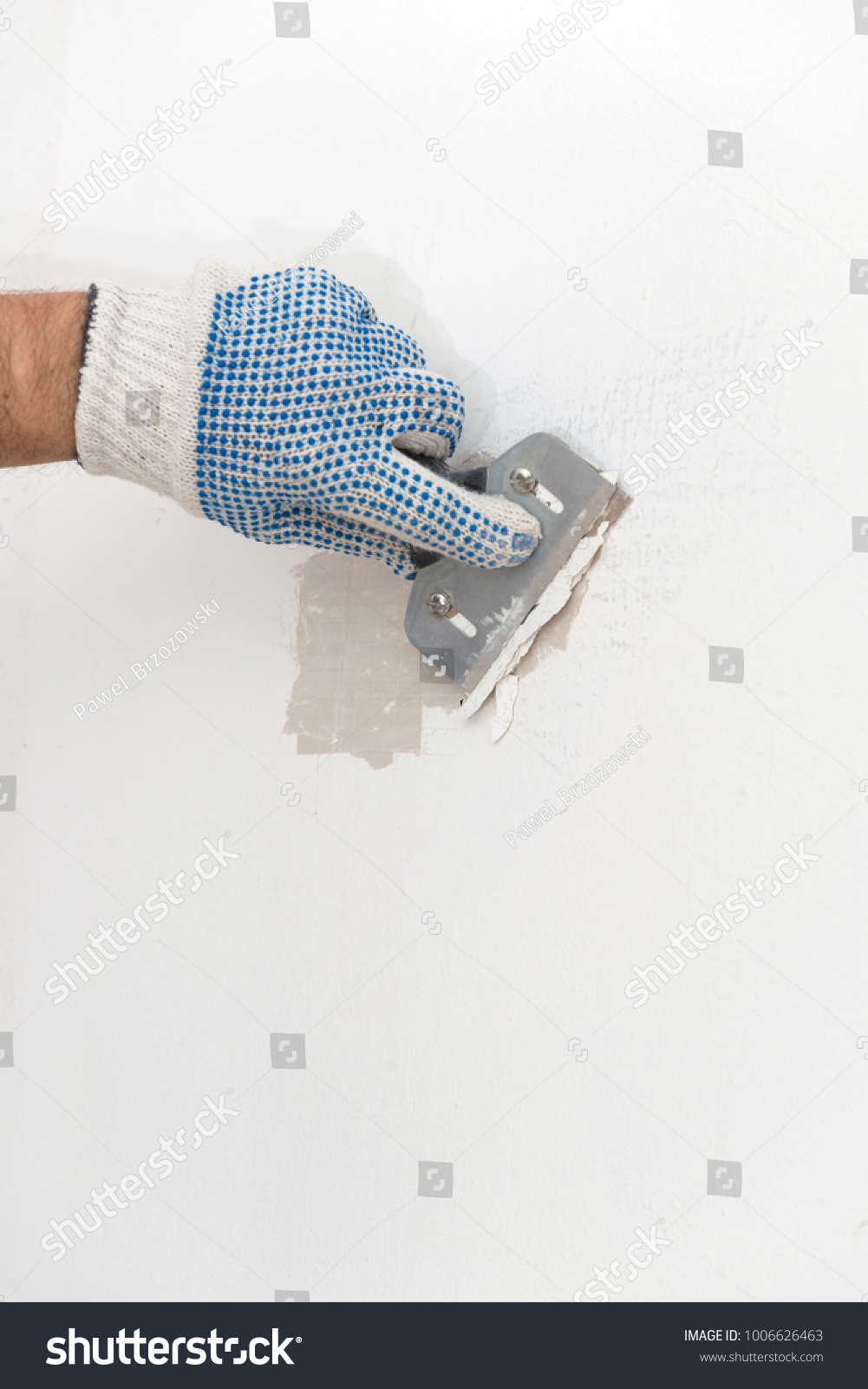 Worker Hand Scraping Old Paint On Stock Photo Royalty Free