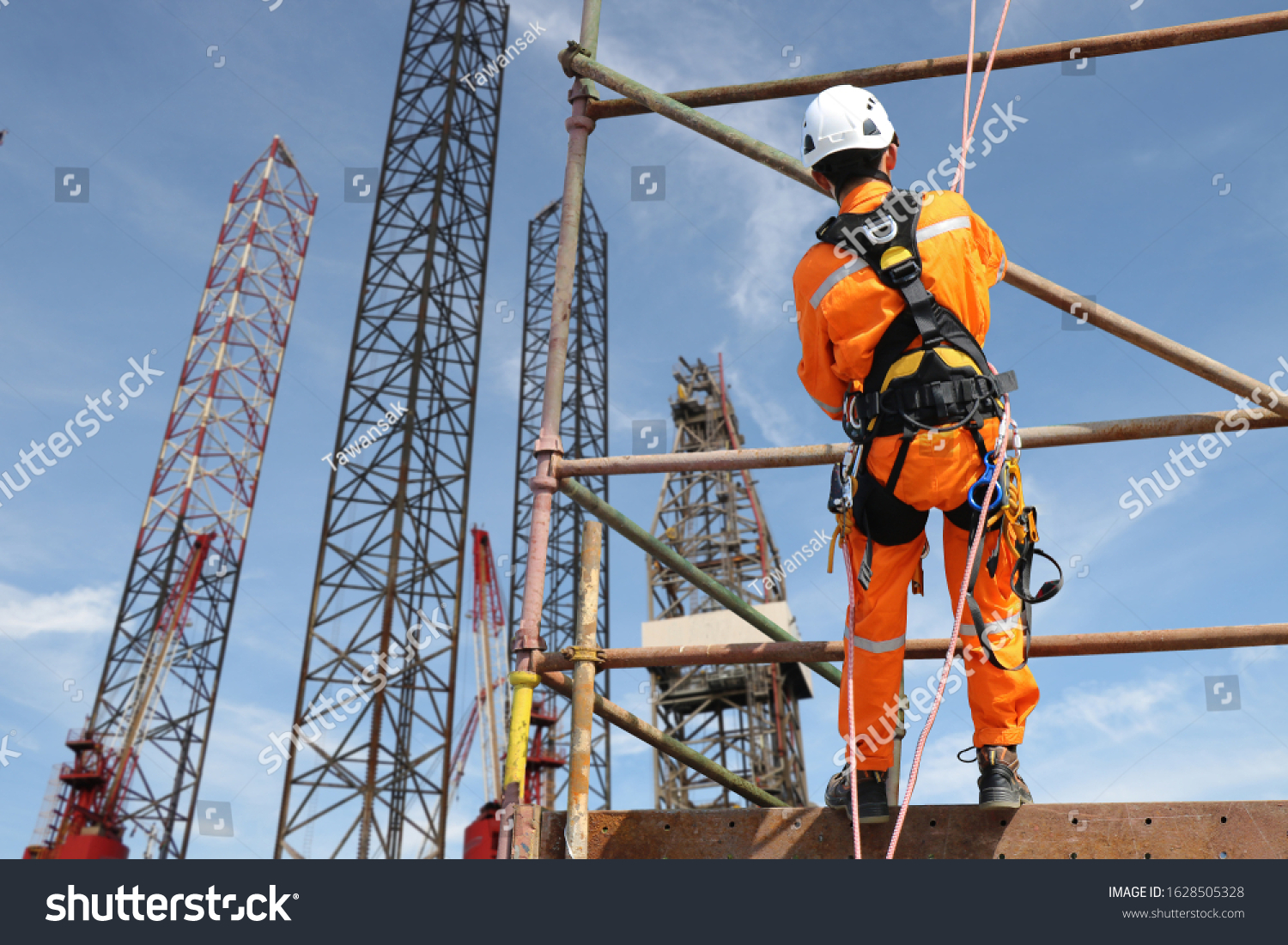 Worker On High On Scaffolding Wearing Stock Photo 1628505328 Shutterstock