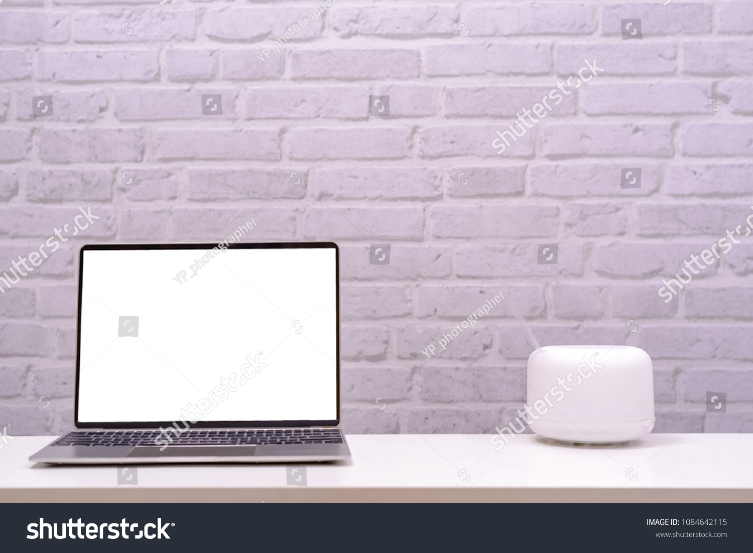 Download Workspace Laptop Blank Screen Aroma Oil Stock Photo Edit Now 1084642115