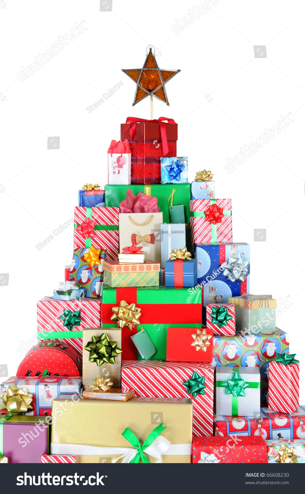 Wrapped Presents Stacked In The Form Of A Christmas Tree With A Star At ...