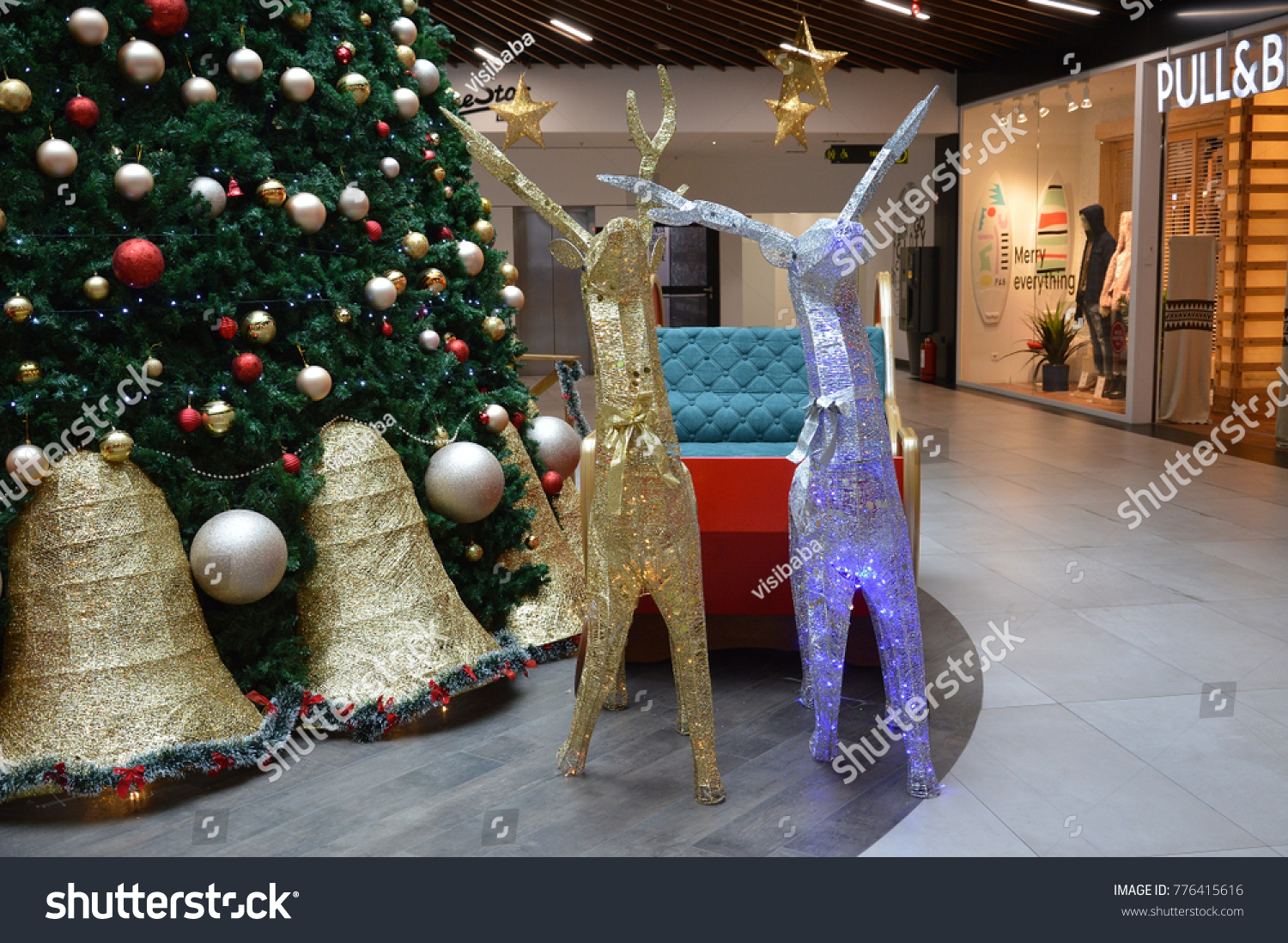 Wrought large christmas tree on the ground floor of a shopping center in city Tuzla of12
