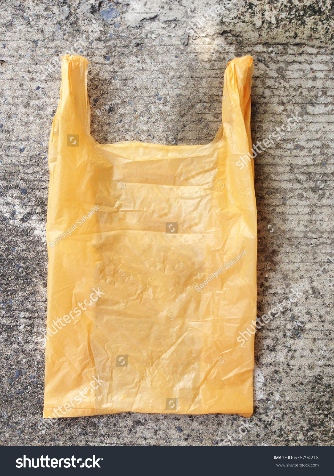 Download Yellow Plastic Bag On Cement Floor Royalty Free Stock Image Yellowimages Mockups