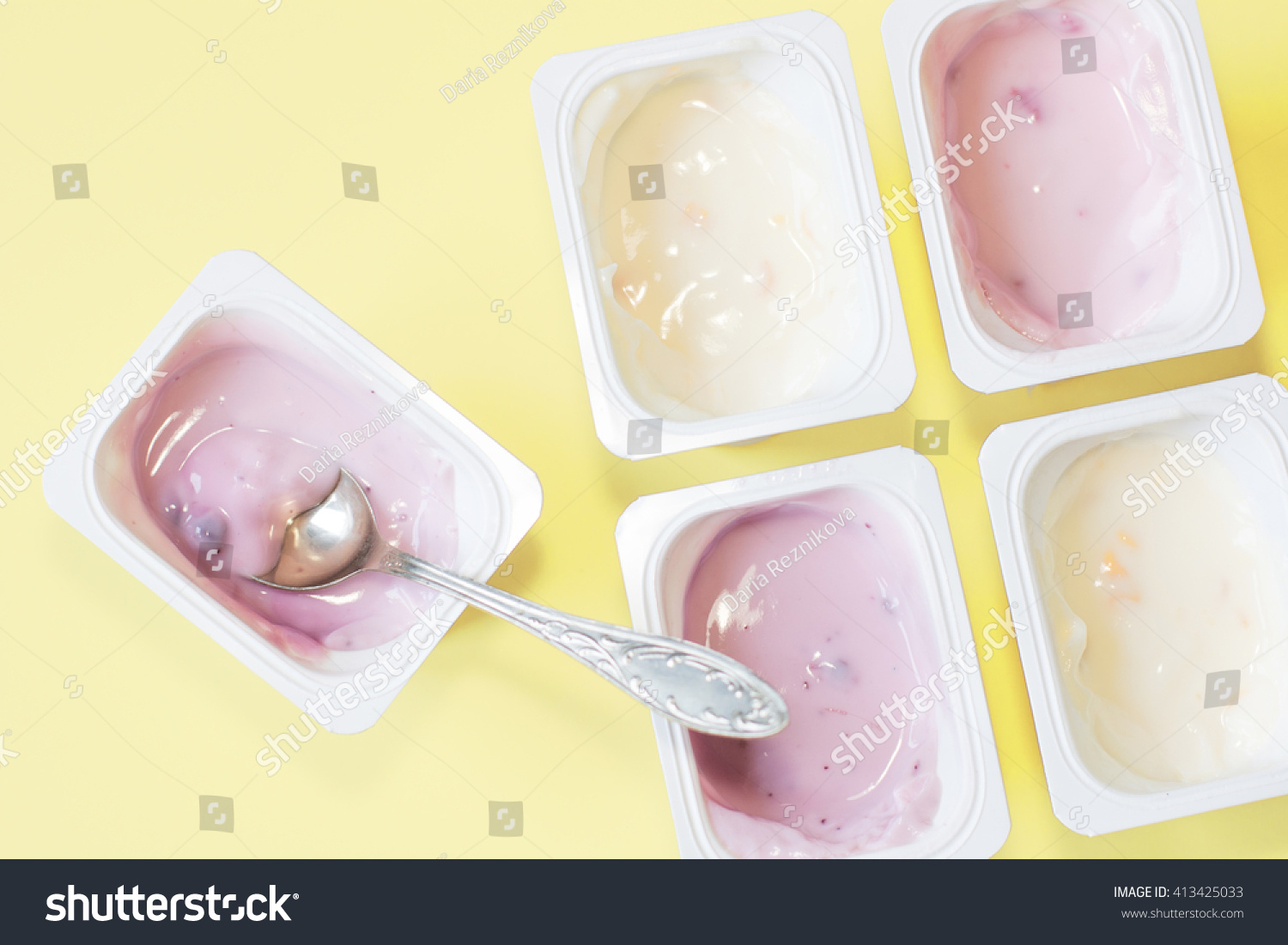 Yogurt Plastic Cups On Yellow Background Food And Drink Stock Image 413425033