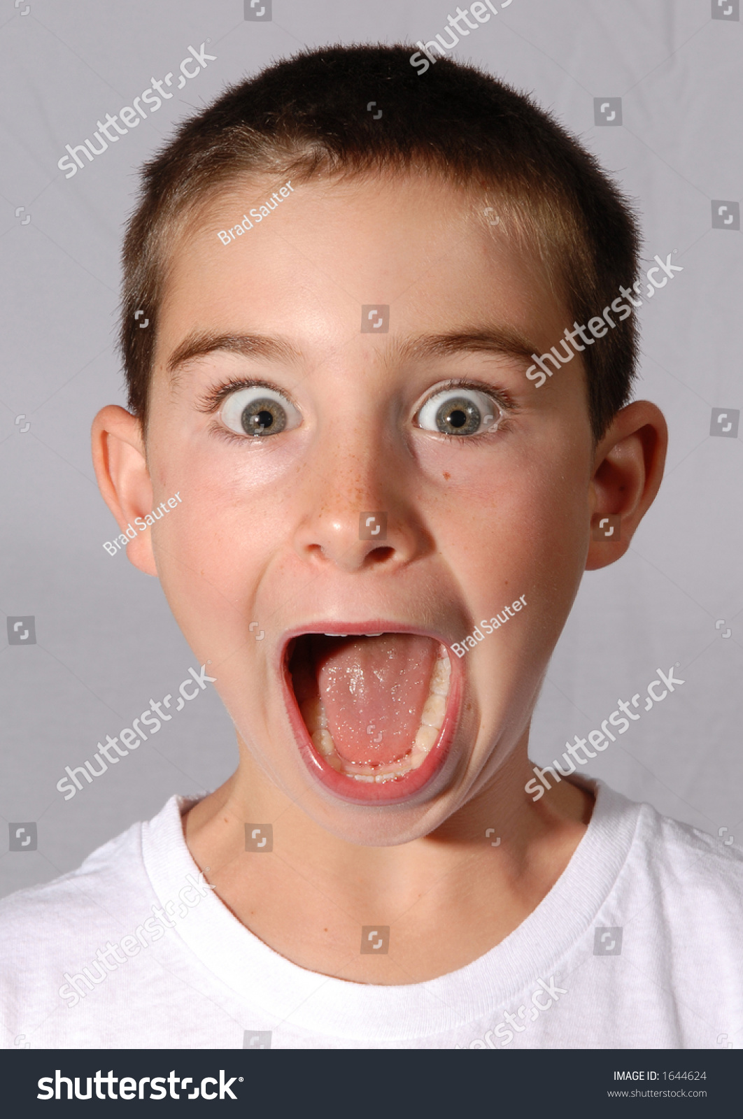 Yong Boy White Shirt Shocked Look Stock Photo 1644624 - Shutterstock