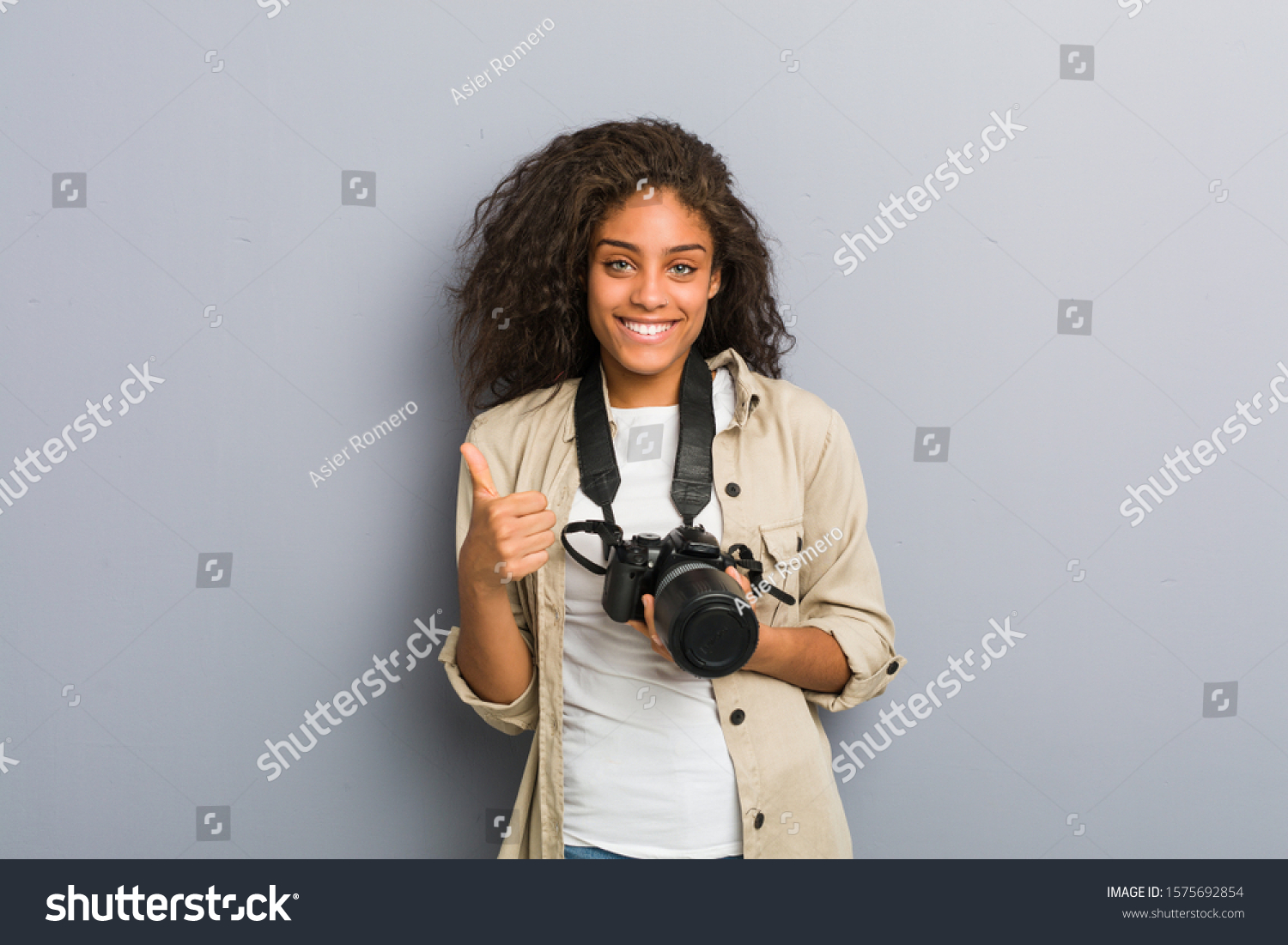 Young African American Photographer Woman Holding Stock Photo 1575692854 Shutterstock Young African American Photographer Woman Holding Stock Photo 1575692854 Shutterstock