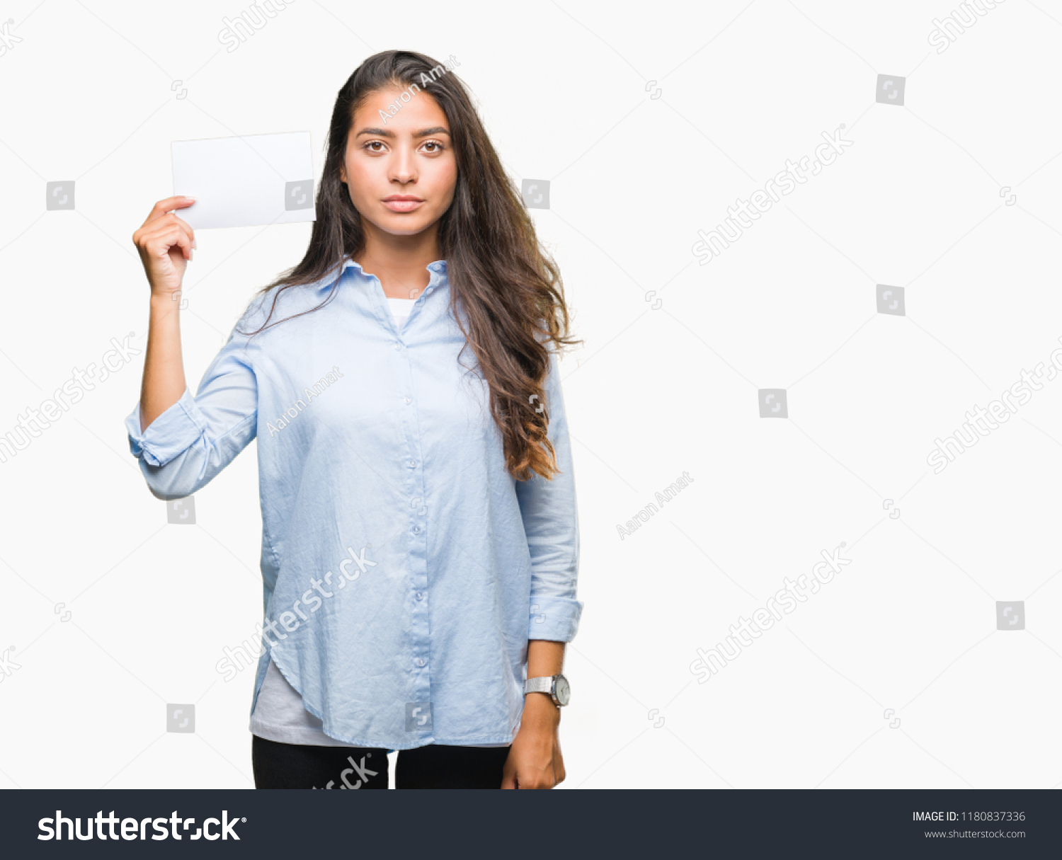 young arab woman holding blank card stock photo (edit now