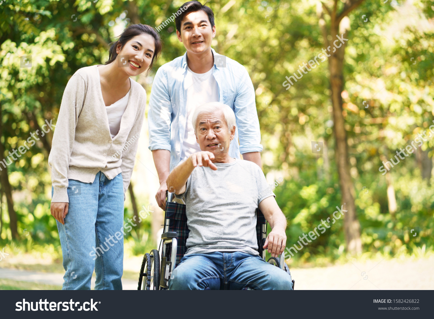 Young Asian Couple Wheelchair Bound Father Stock Photo 1582426822 ...