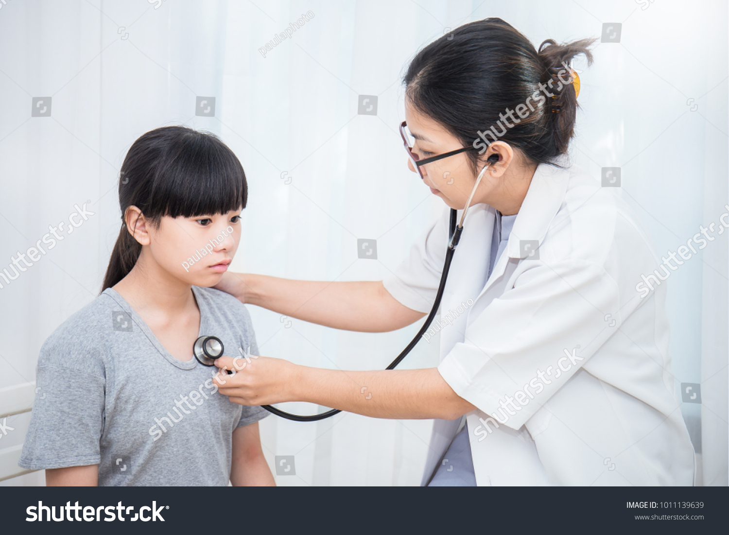 asian women being examined by doctor Dick and jane collection