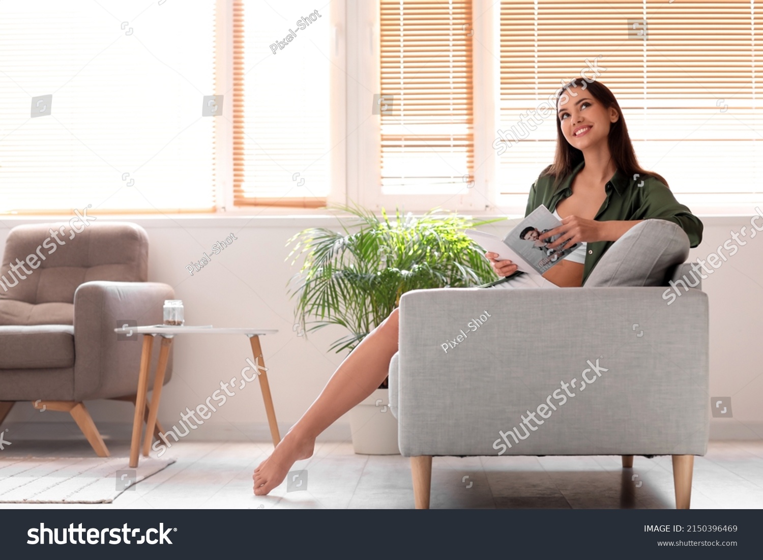 Young Barefoot Woman Reading Magazine On Stock Photo 2150396469 ...