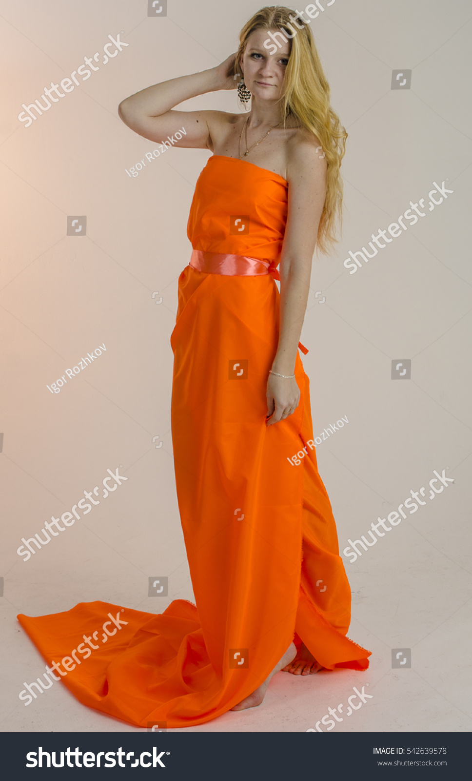 Orange dressed blonde