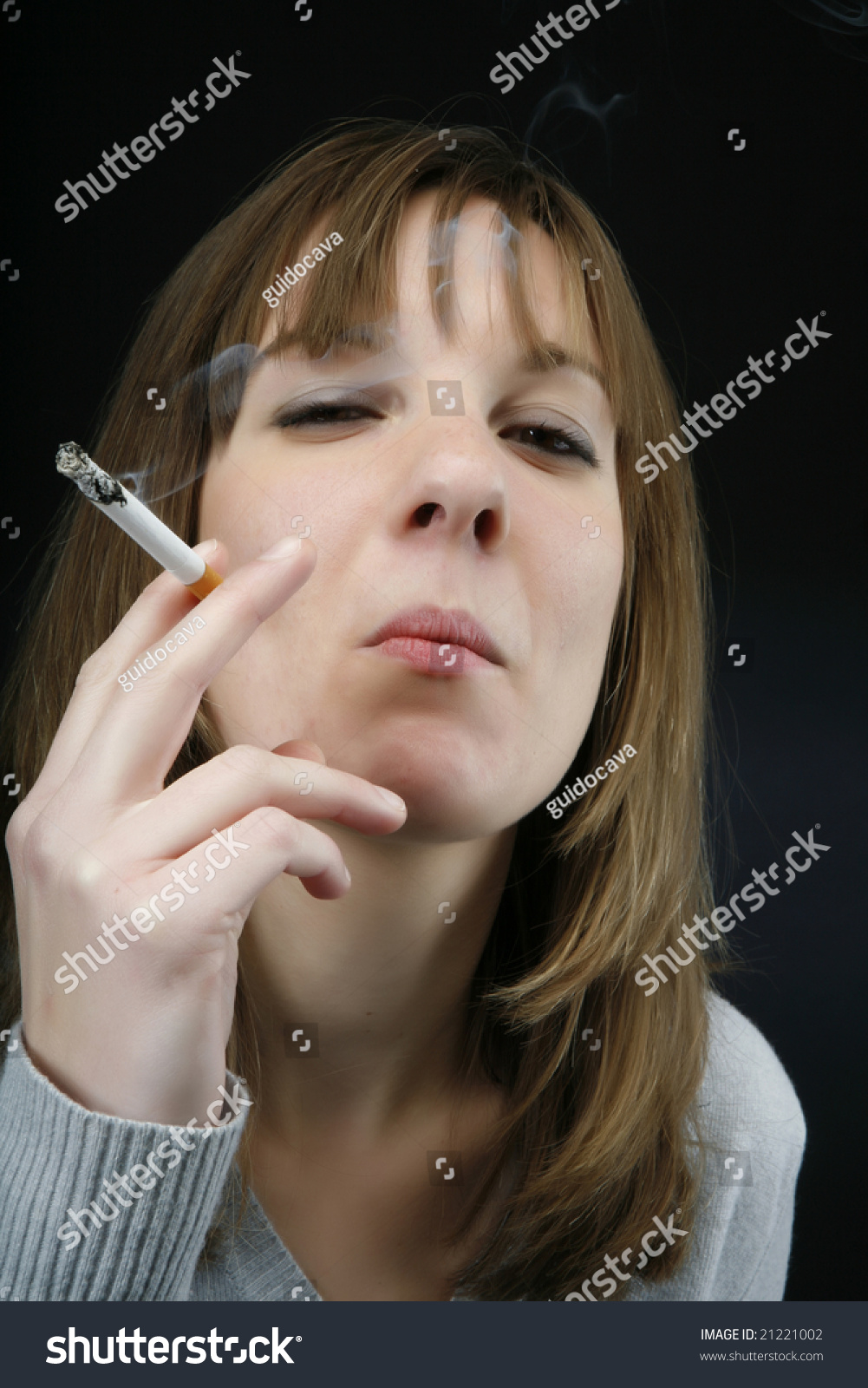 Young Beautiful Girl Smoking Cigarette Stock Photo 21221002 | Shutterstock