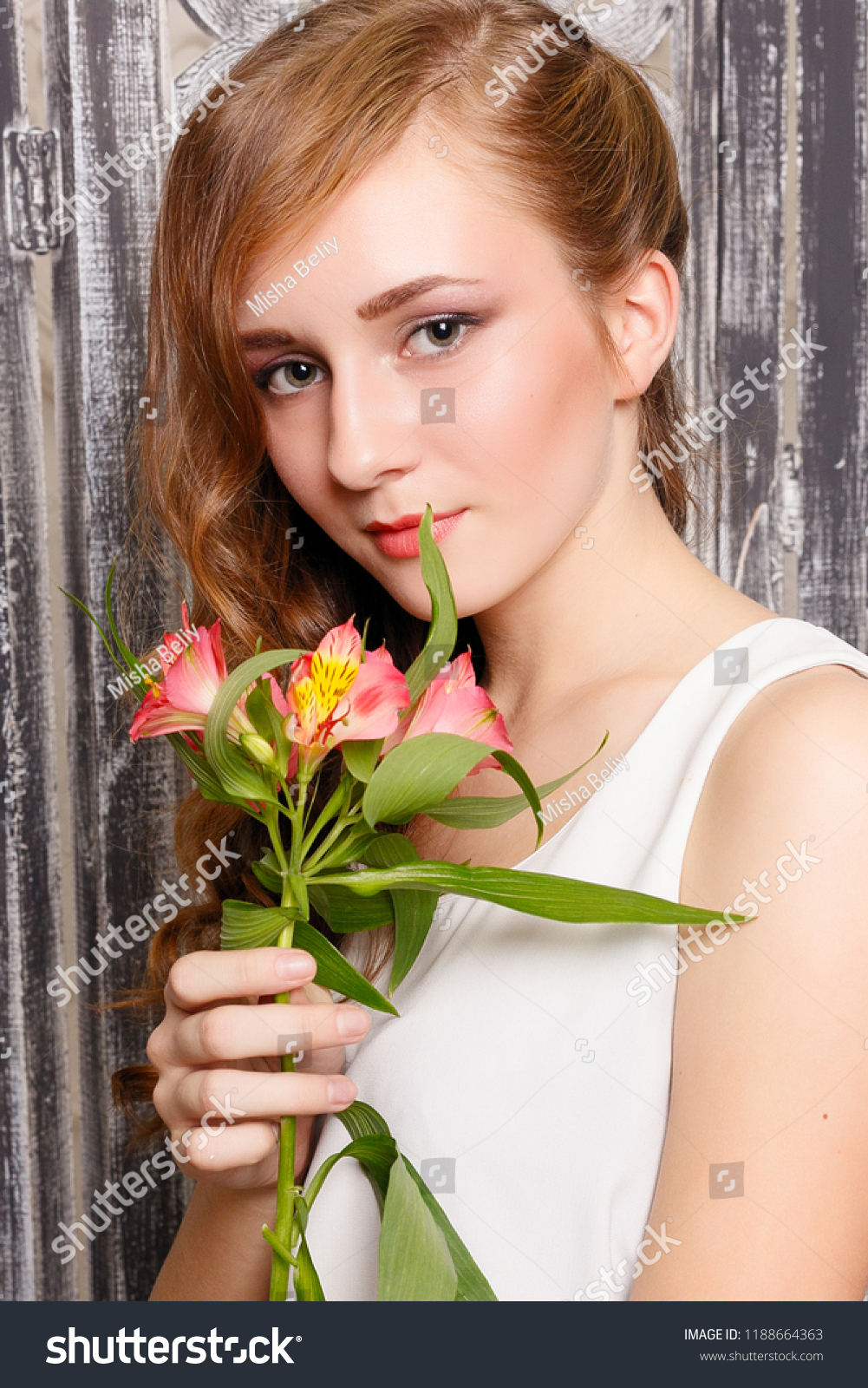 Young Beautiful Lady Flowers On Grey Stock Photo Edit Now 1188664363