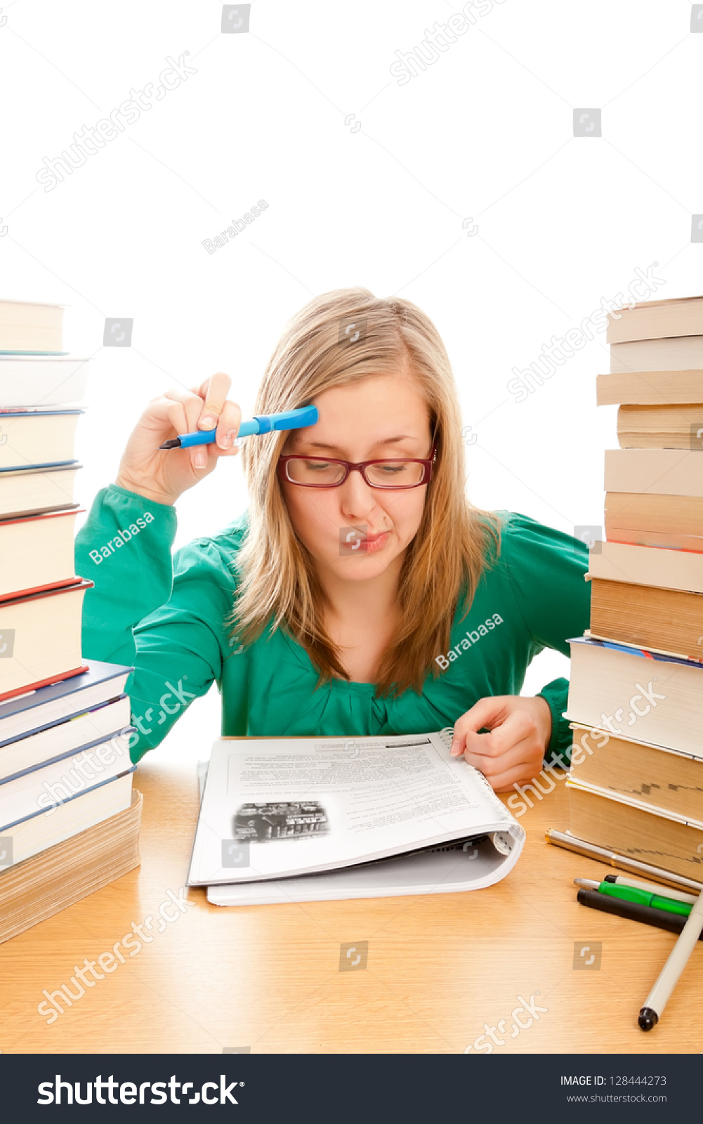 Young Beautiful Student Concentrating Hard On Her Studies. Stock Photo ...