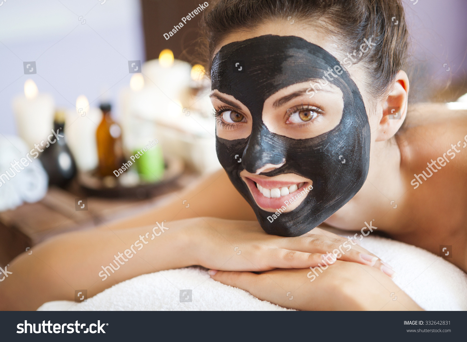 Young Beautiful Woman In A Mask For The Face Of The Therapeutic Black ...